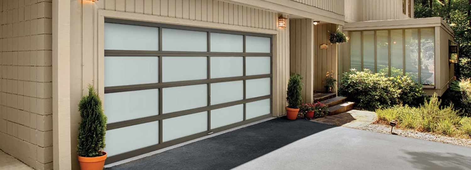 Full-view aluminum garage door with frosted glass panels